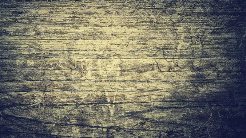 Close-up of dark antique hardwood grain similar to stinkwood