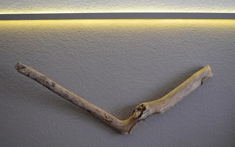Driftwood decorated with low-voltage battery-powered LED strip lighting