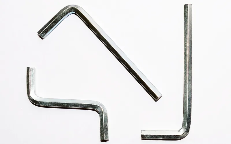 hex Allen keys for driving a threaded insert three hex Allen keys used to drive a hex-drive threaded insert flush