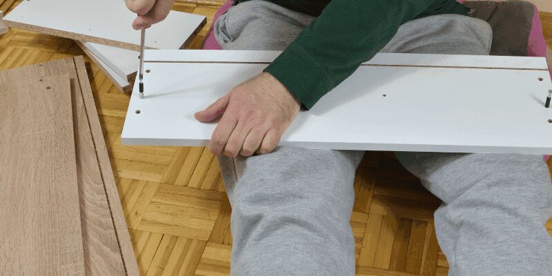 Thread insert installed into a pre-drilled wood hole