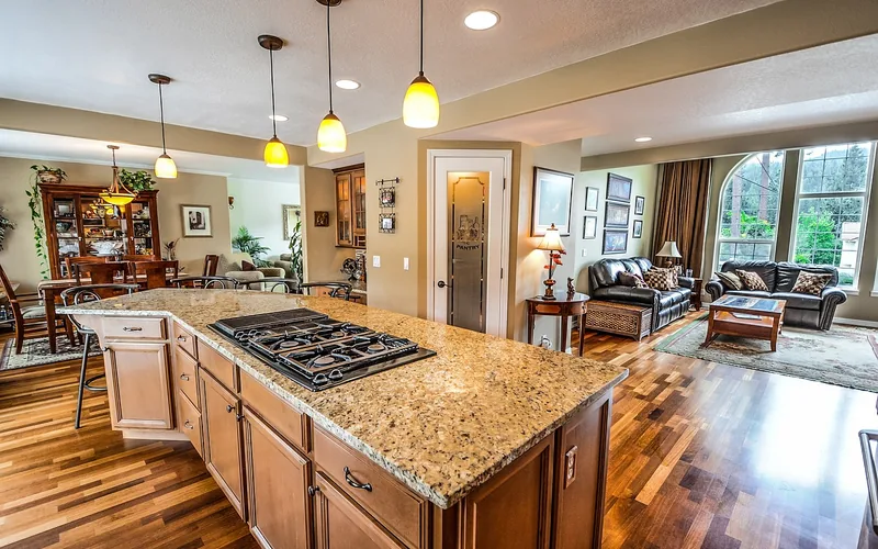 modern kitchen with white laminate countertop installed on base cabinets