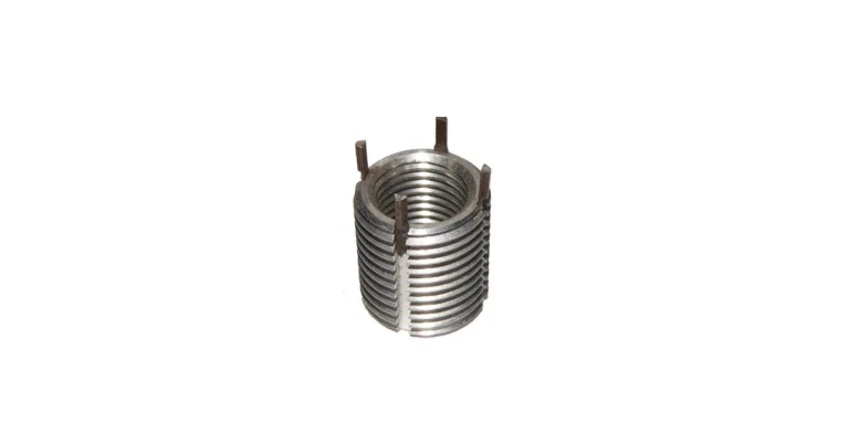Key-locking thread insert with metal tabs showing internal threads