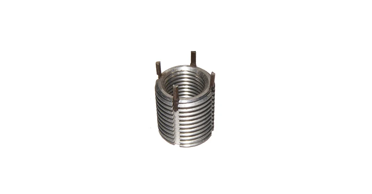 Key-locking thread insert with metal tabs showing internal threads