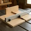 Table saw crosscut sled with an aluminum fence for supported angle and square cuts