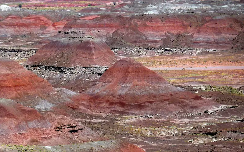 Weathered badlands of the Painted Desert in Petrified Forest National Park, Arizona Weathered badlands of the Painted Desert in Petrified Forest National Park, Arizona
