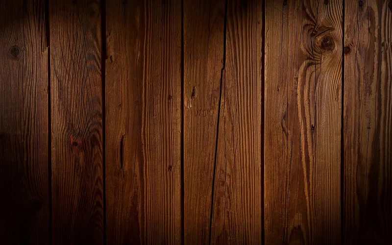 Bare wood boards with visible grain and knots