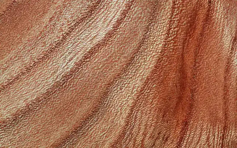 close-up of reddish furniture-grade wood grain