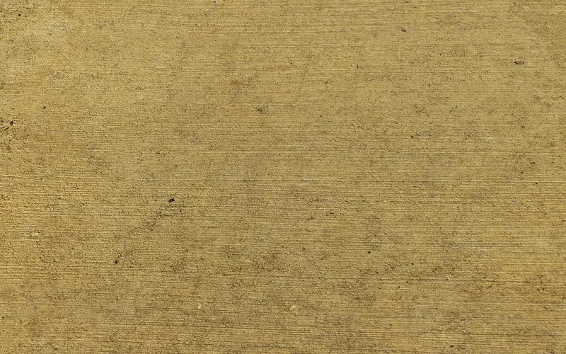 Close-up of a fine-faced particle board surface Close-up of a fine-faced particle board surface
