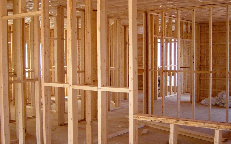 plywood wall sheathing panels nailed to house frame during construction