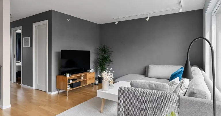Oak floor and oak media console in a bright living room, the kind of interior wood Rubio Monocoat is used on