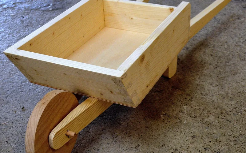Simple solid wood box with four sides and a flat bottom