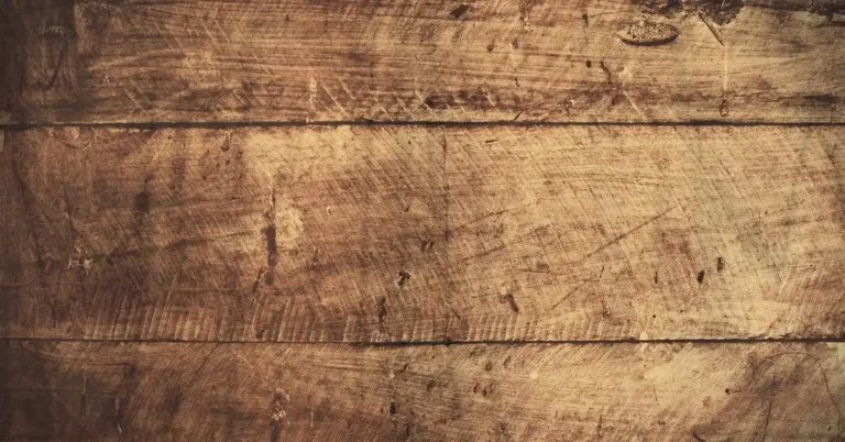 Close-up of visible scratches across vinyl plank flooring boards