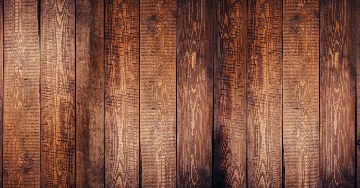 Close-up of brown hardwood floorboards laid side by side