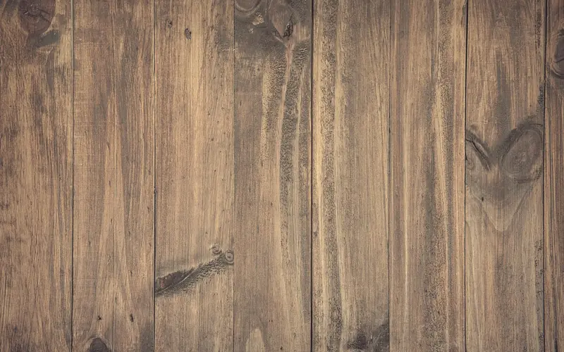 Hardwood floorboards with visible seams where boards rub and squeak Hardwood floorboards with visible seams where boards rub and squeak