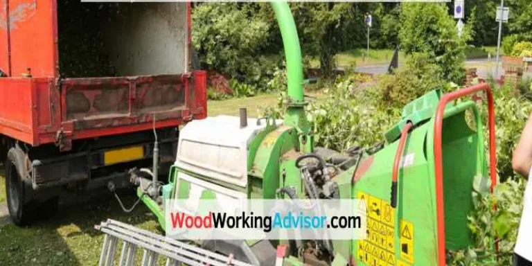 Wood chipper machine processing branches