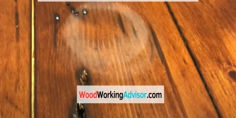 Water ring stain on a wood table surface