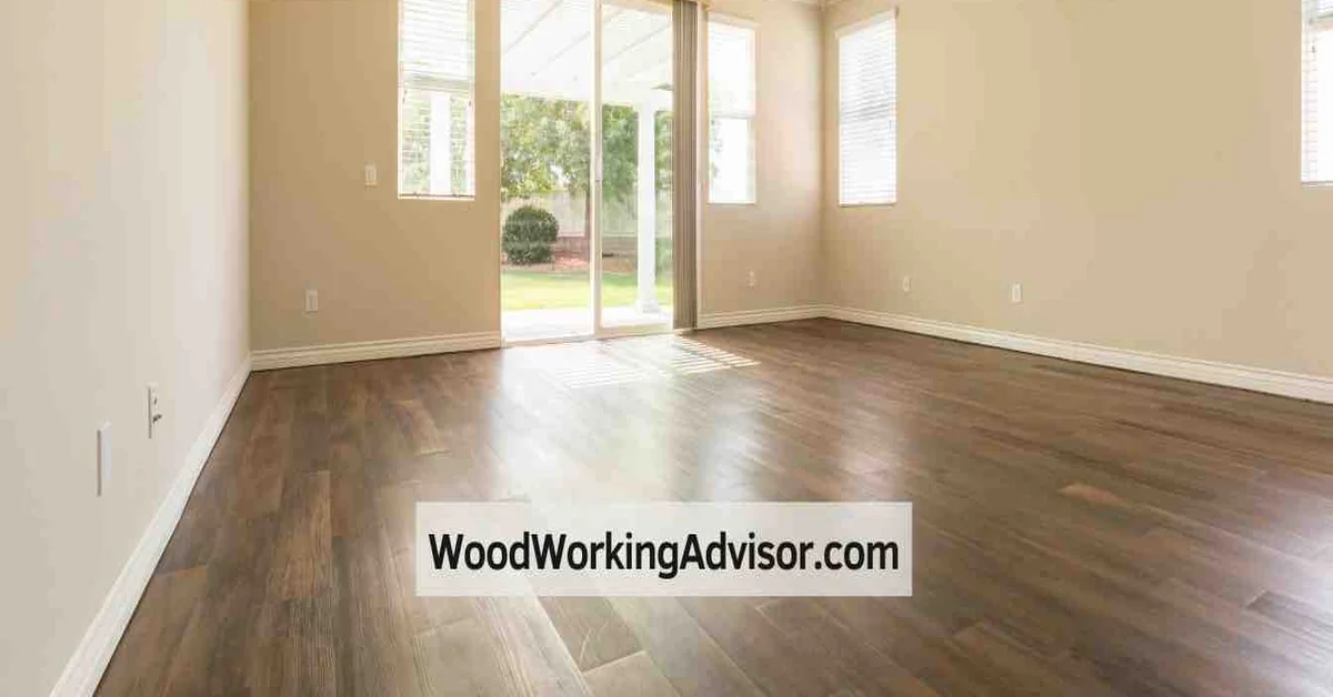 Empty room with plywood subfloor finished to look like hardwood flooring