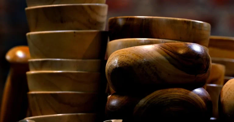 handmade wooden crafts displayed for sale at a market stall