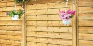 How to Install Wood Fence Panels on Uneven Ground