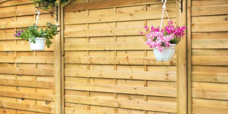 How to Install Wood Fence Panels on Uneven Ground