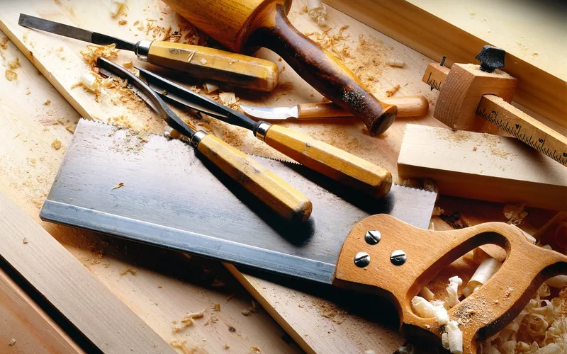 Backsaw, chisels, and wooden mallet used for cutting reinforcing joints Backsaw, chisels, and wooden mallet used for cutting reinforcing joints