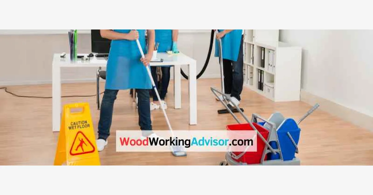 Cleaning engineered hardwood floors with a damp mop and mop bucket