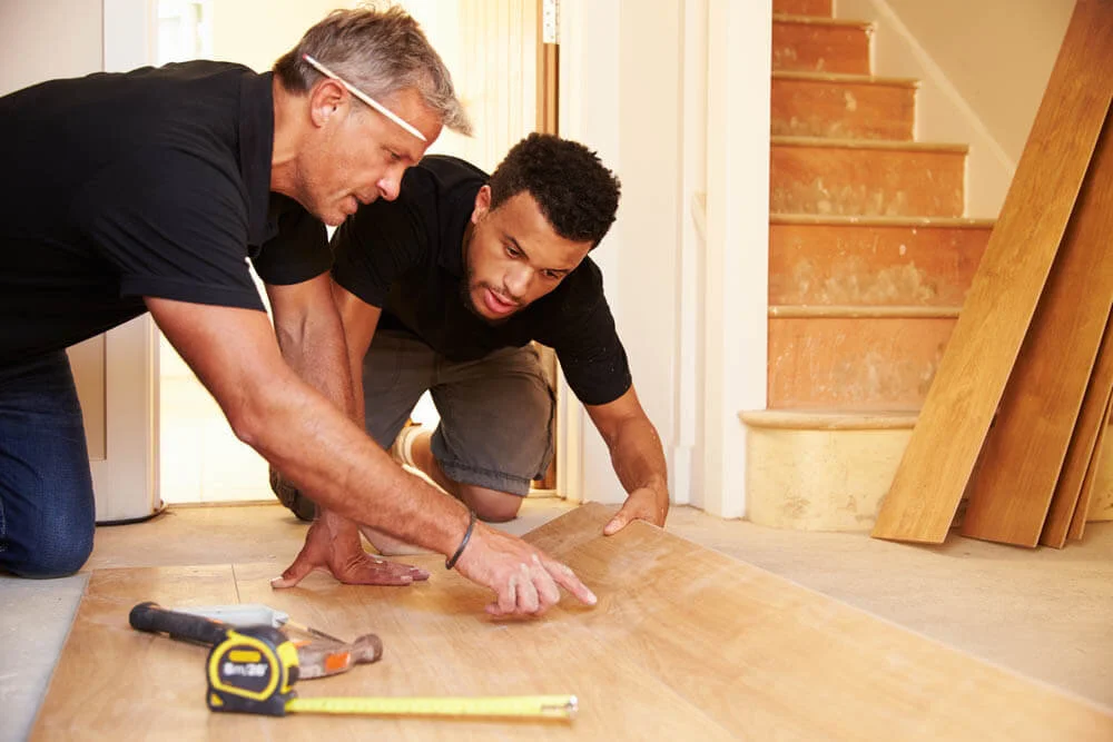 Professional flooring installation project illustrating labor costs factored into a flooring estimate