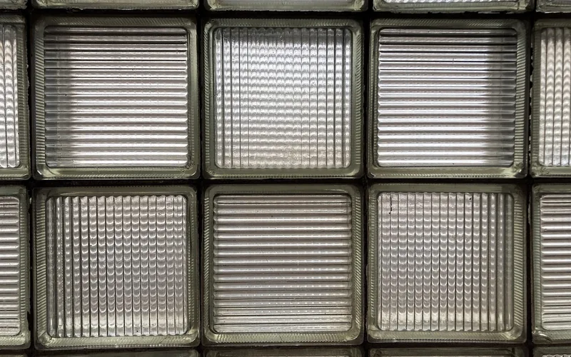 close-up of glass block wall showing individual block texture and mortar joints