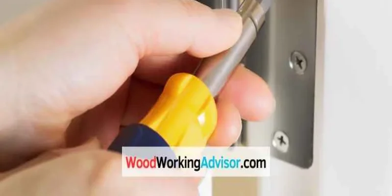 Fixing a loose door hinge screw with a screwdriver