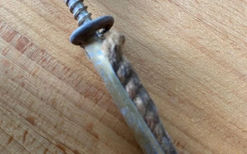 plastic wall plug and screw anchor used to attach wood furring strips or shelving to masonry