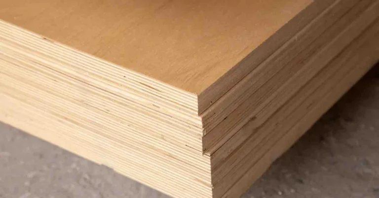 Stack of plywood sheets showing the cross-grain edge layers that give plywood its strength