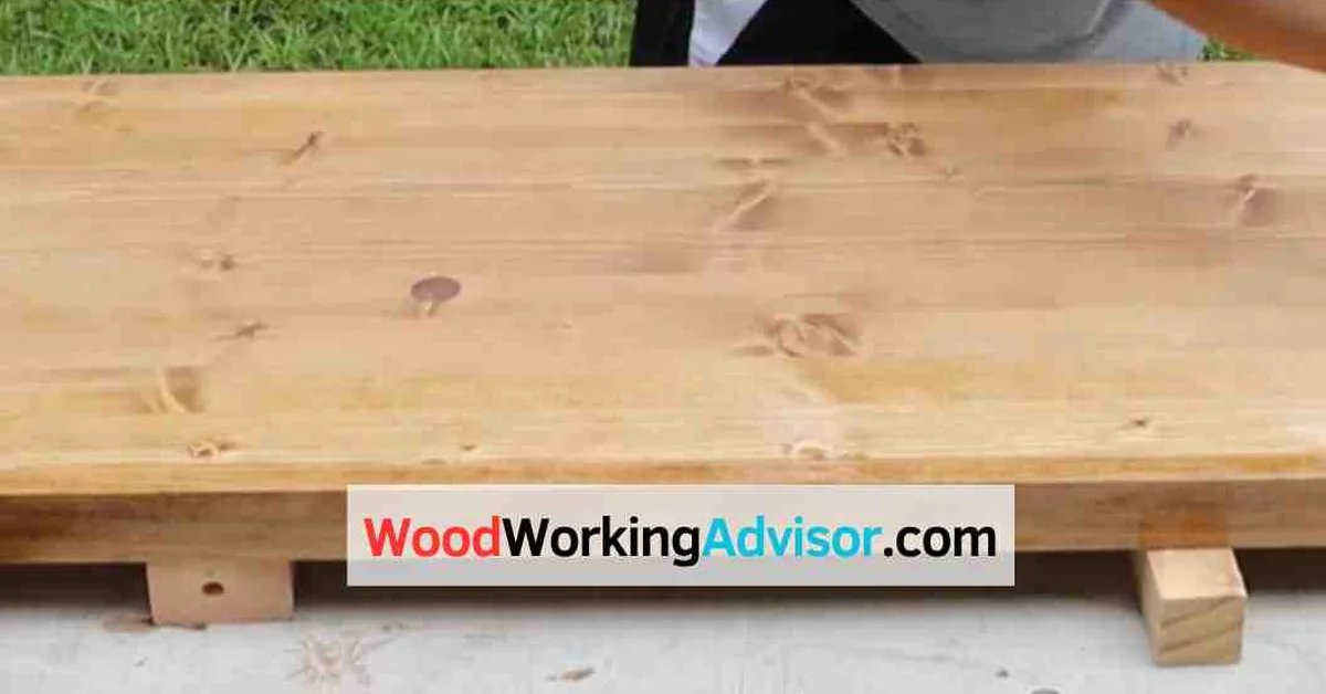 Wood table finish showing polyurethane applied after wax removal