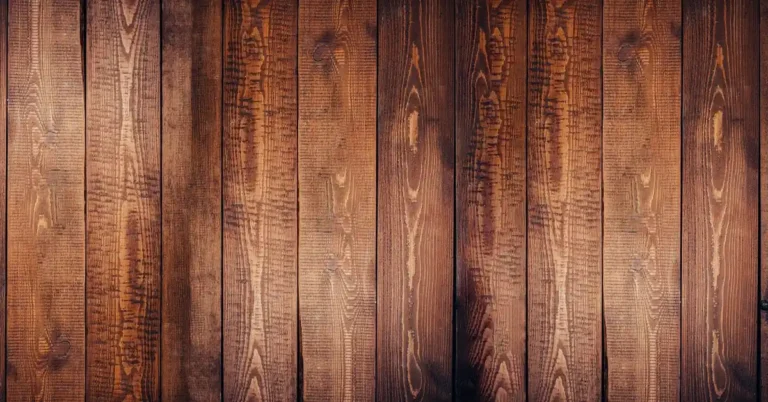 Wide oak plank flooring boards showing continuous wood grain and mineral streaking