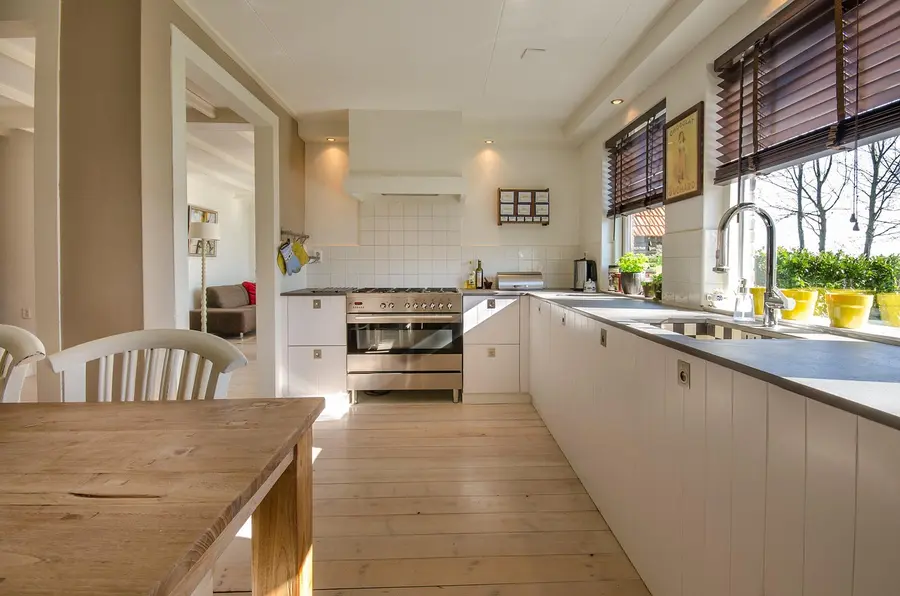 Light oak wood flooring installed in a kitchen Light oak wood flooring installed in a kitchen