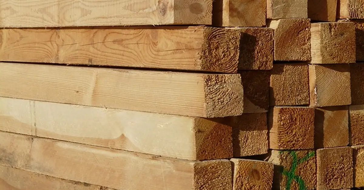 Stack of cut lumber boards used to illustrate wood weight and density calculation