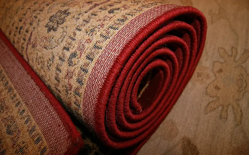 close-up of a handwoven natural fiber rug showing its woven texture close-up of a handwoven natural fiber rug showing its woven texture