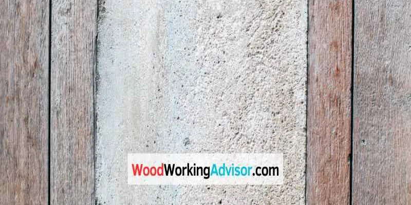 Concrete slab between wood boards