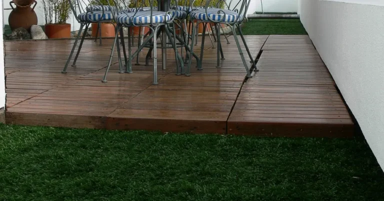 Wooden deck surface where an outdoor rug would typically be placed