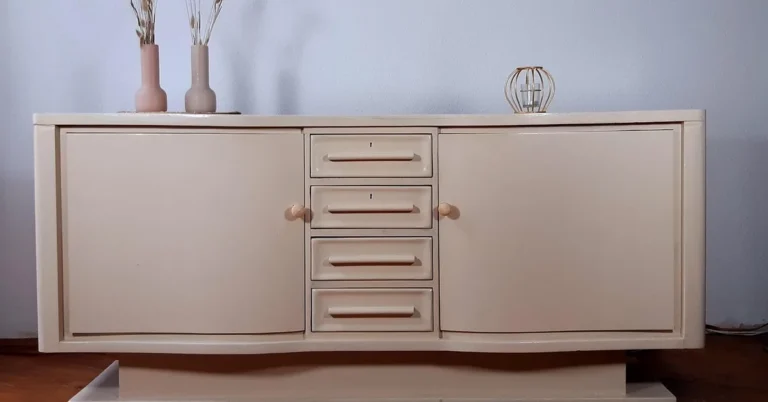 Cream painted sideboard with four center drawers and two doors