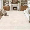 Neutral beige area rug for balancing a heavily wood-paneled room