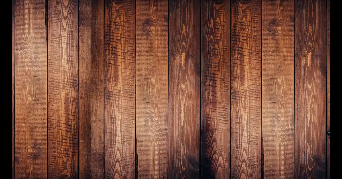 Close-up of warm-toned hardwood floor planks showing natural wood grain