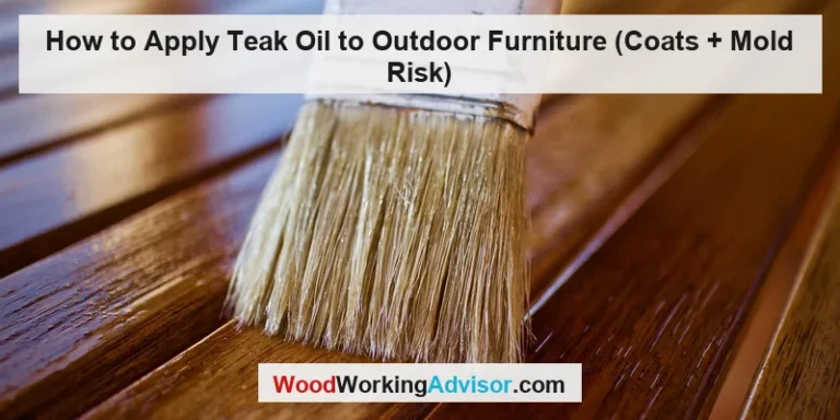 Paintbrush applying teak oil finish to outdoor wood furniture