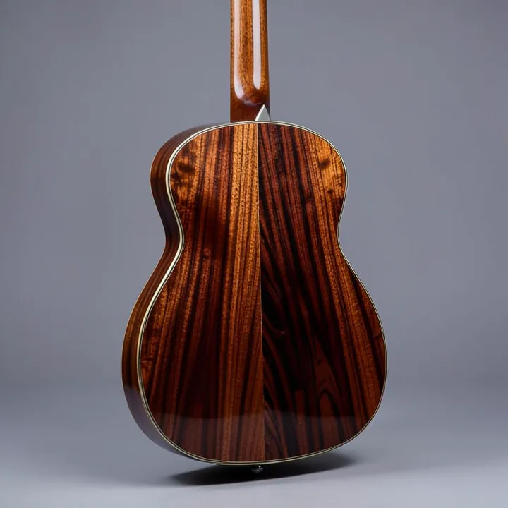 acoustic guitar back and sides made from dark brown exotic hardwood similar to shedua acoustic guitar back and sides made from dark brown exotic hardwood similar to shedua