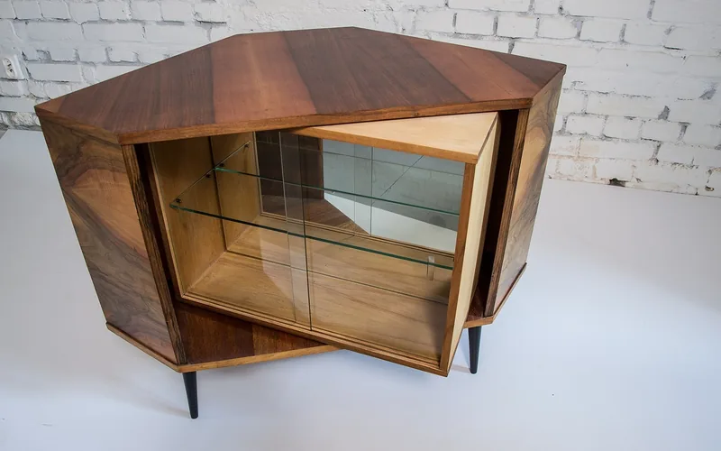 Mid-century wood cabinet with a glossy hand-polished wax finish on walnut veneer