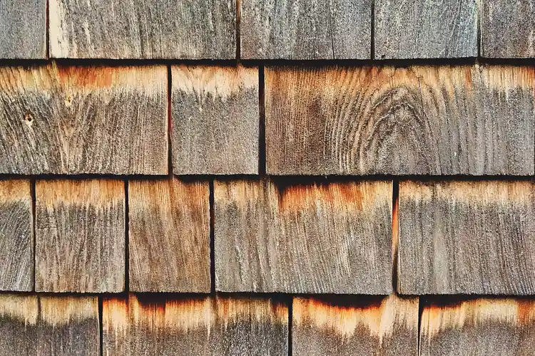 Cedar shingles showing the silvery-gray patina cedar develops as it weathers outdoors