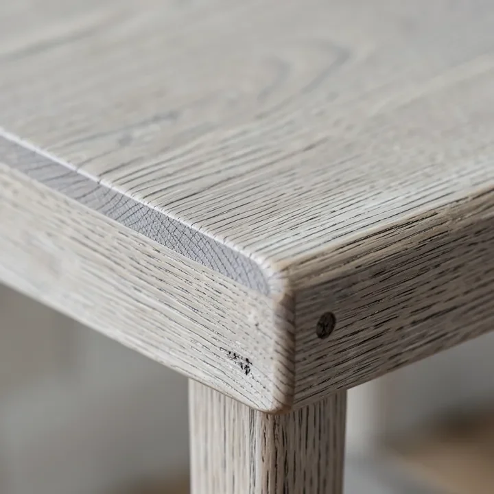 close-up of natural ash wood grain on a barstool seat close-up of natural ash wood grain on a barstool seat