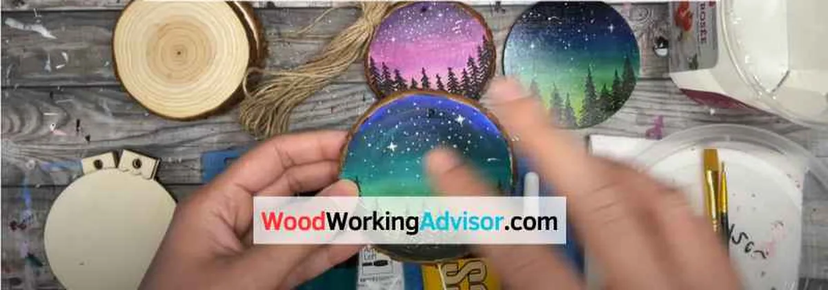 Hand-painted wood slice Christmas ornaments with night sky design