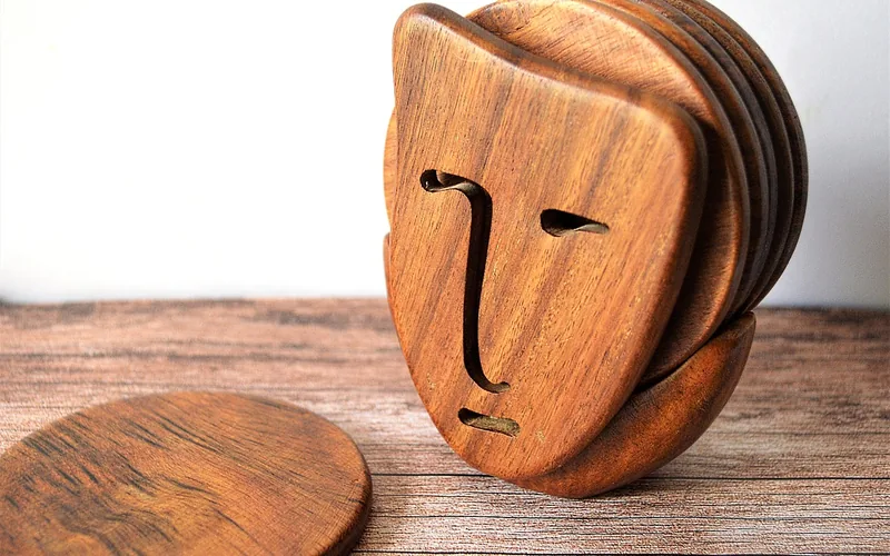 Hand-carved wooden coasters finished with a food-safe oil sheen Hand-carved wooden coasters finished with a food-safe oil sheen