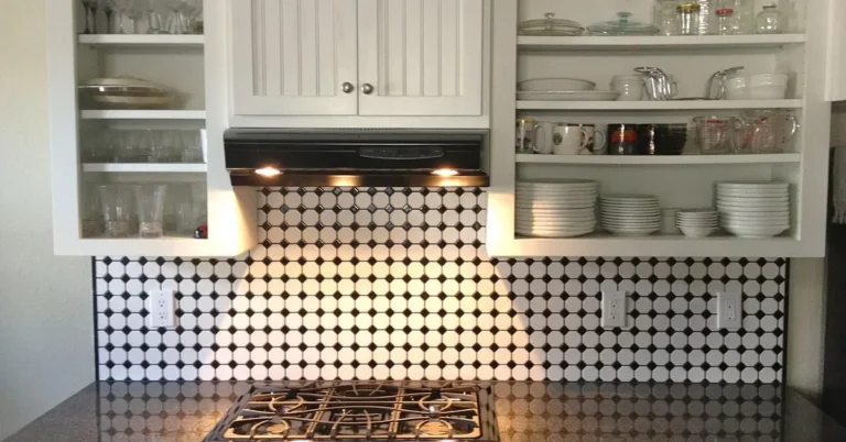 white painted kitchen cabinets made from MDF panel with glass-front upper cabinets