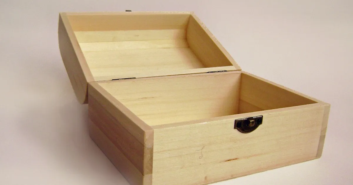 Open unfinished wooden box showing the lid hinge line